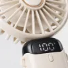 The portable silent small fan with a white handheld fan and a charging base has a long battery life Application Scenario